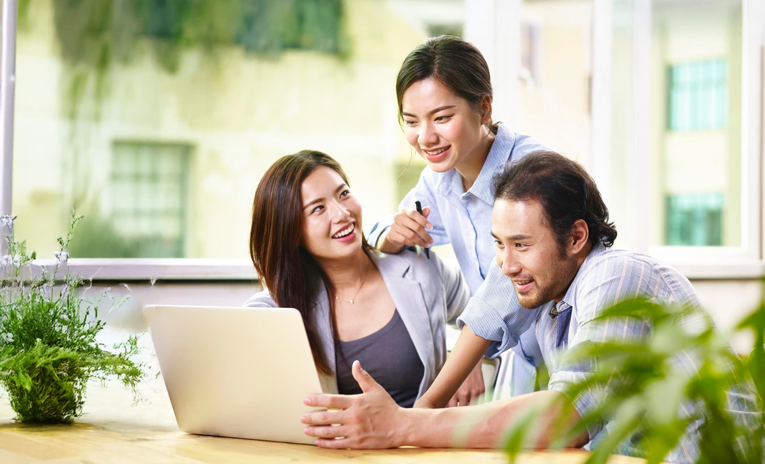 Value Chain Asia team collaborating in modern office environment